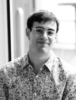 Filippo's half-length portrait, smiling, in black and white